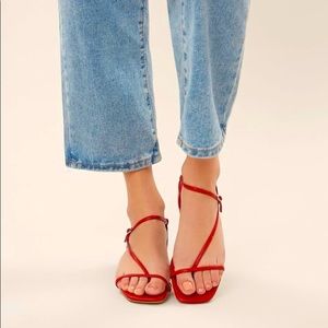 Red strappy flat sandals